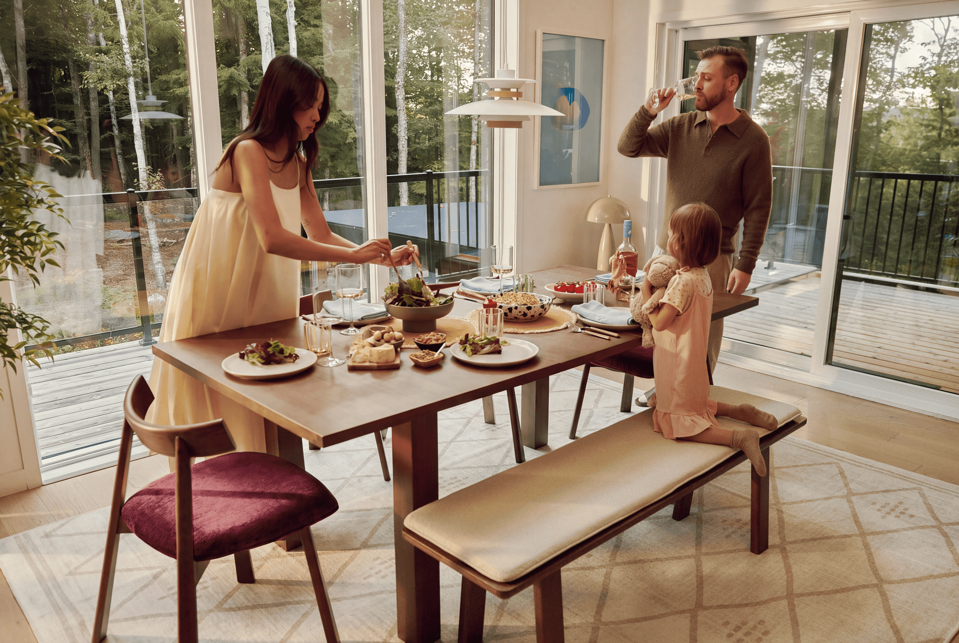 A Cozey Ushi dining table with a bench and four chairs