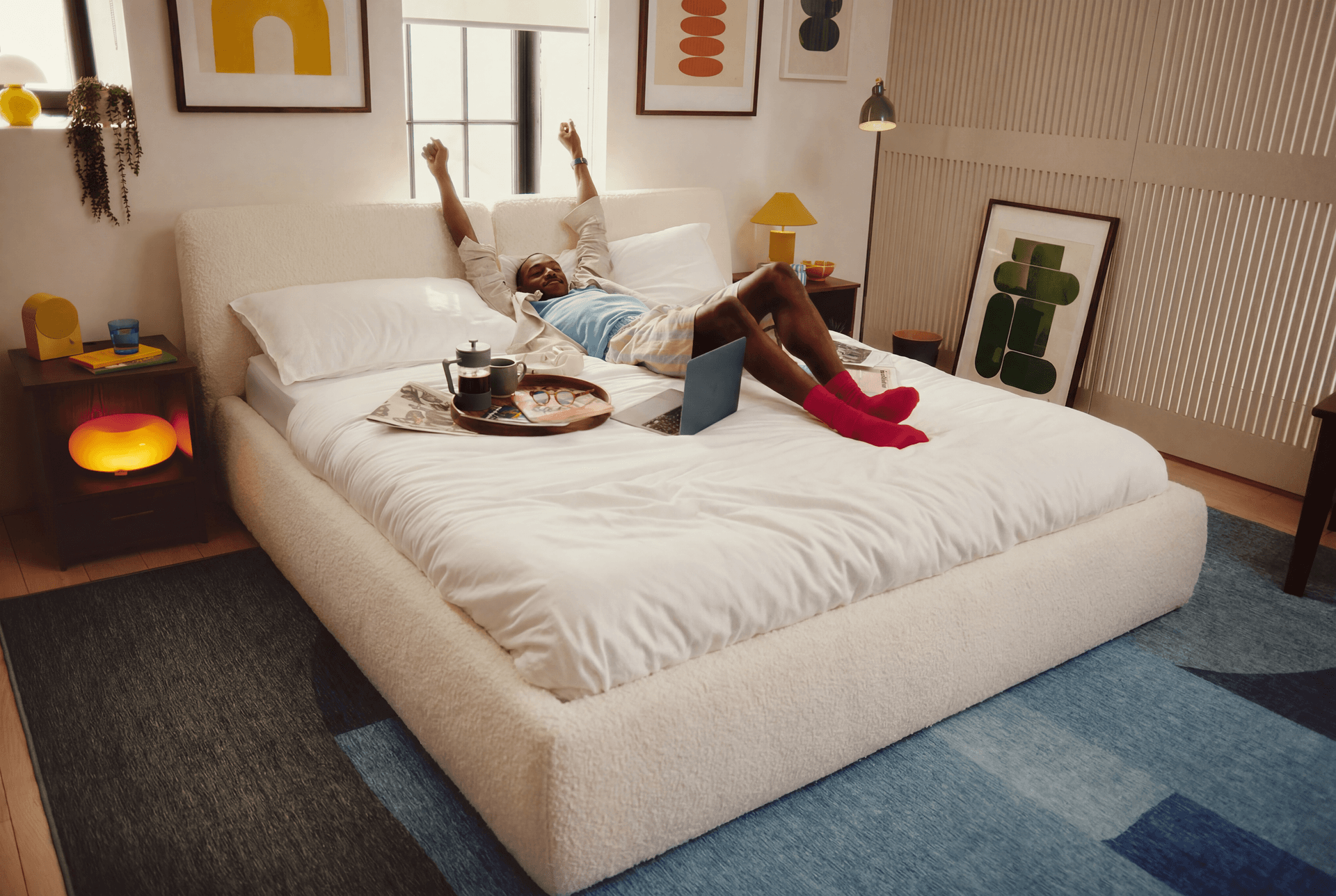 Cozey Ara upholstered bed with a Pillow headboard