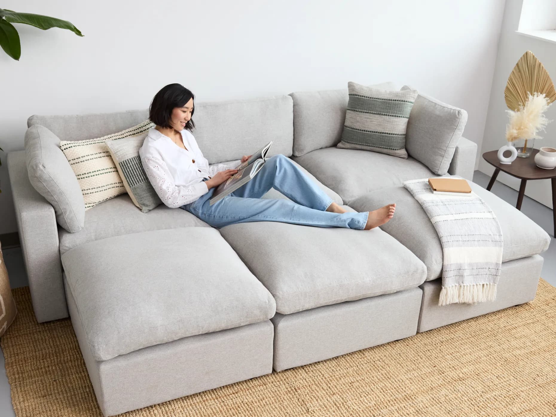 A person lounging on a sofa