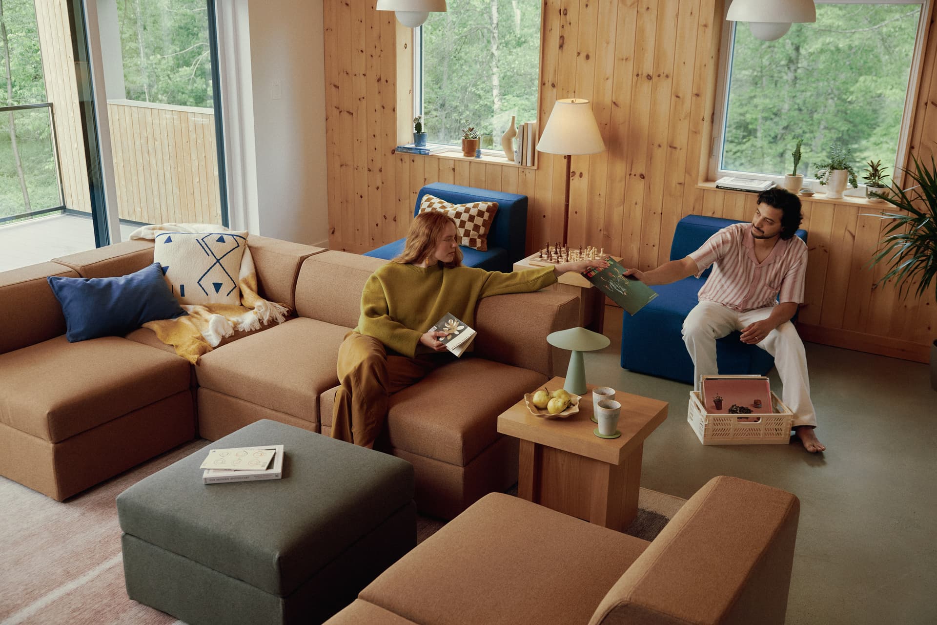 A couple sitting in their living room