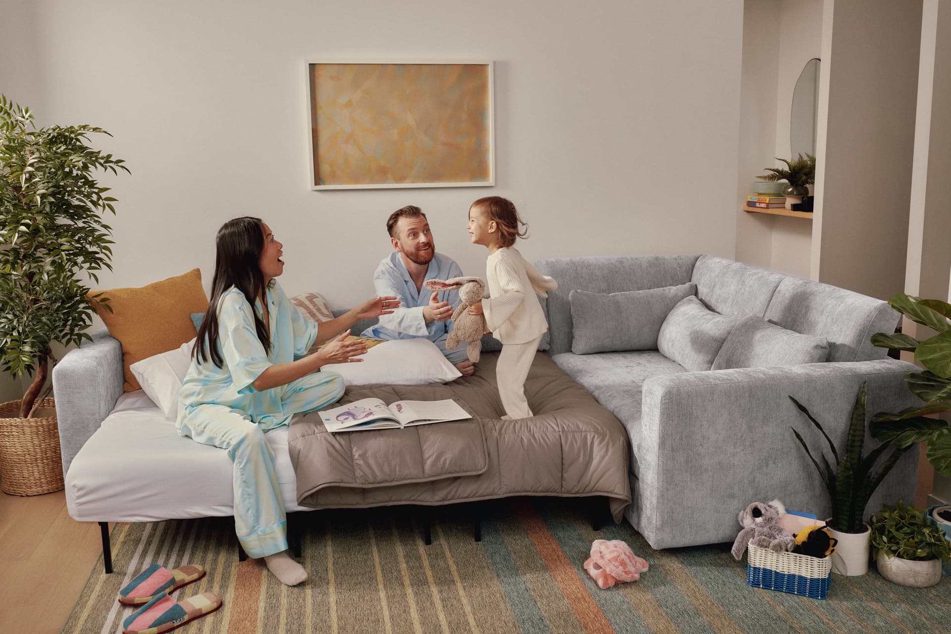 A Family on a Cozey Sofa Bed